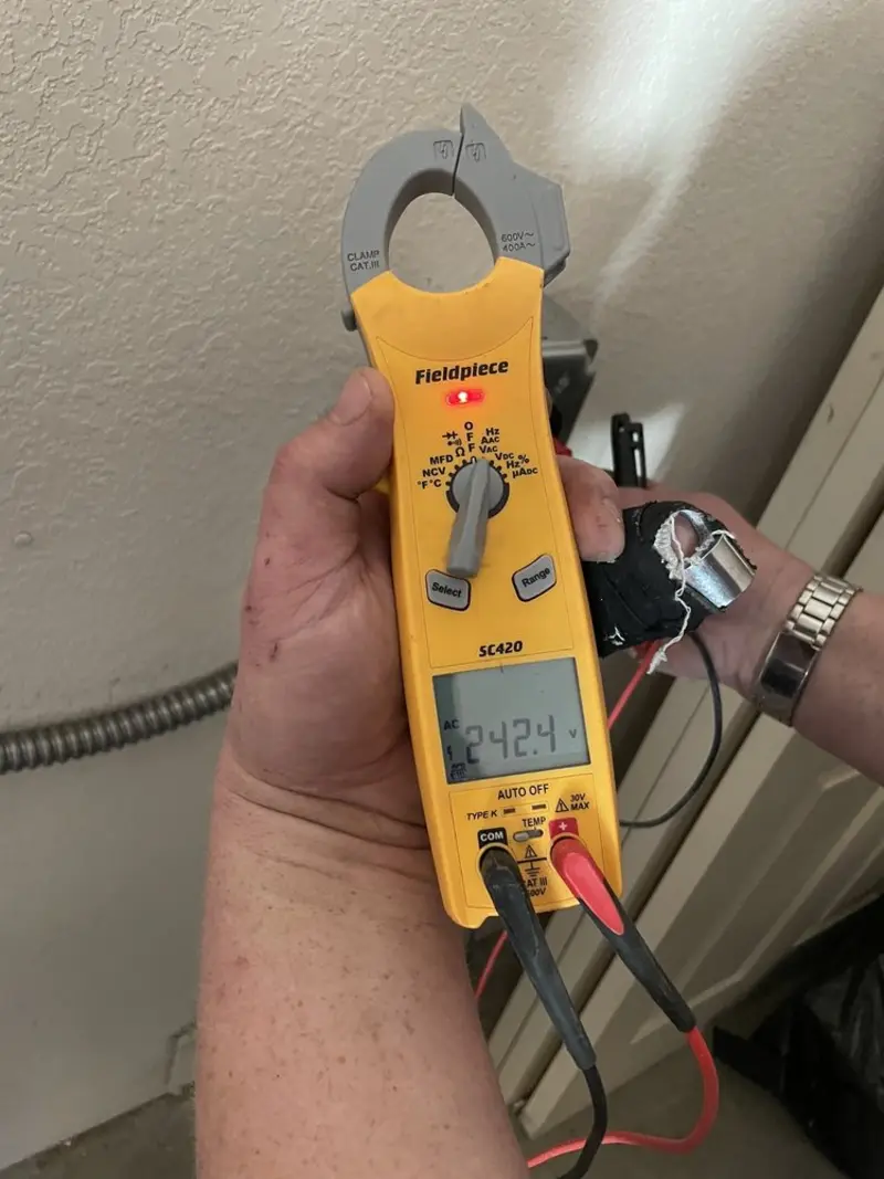 Voltage testing with clamp meter during Generator Installation in Vinings